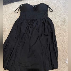black dress that has boob cups in them